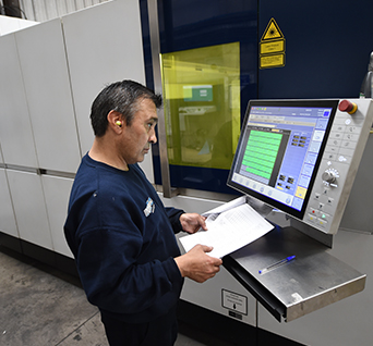 operator using laser cutting machine